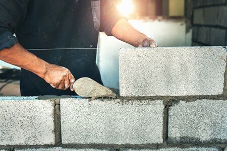 Worker Laying Bricks, Bricklayer & Masonry Accidents