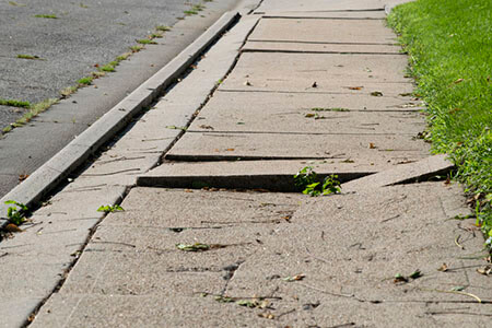 cracked sidewalk, types of premises liability accidents