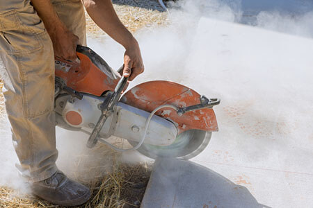 construction worker using saw blade