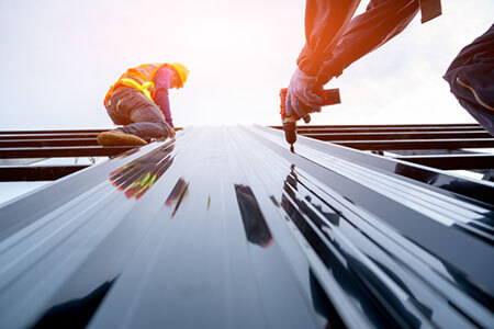 construction workers on roof