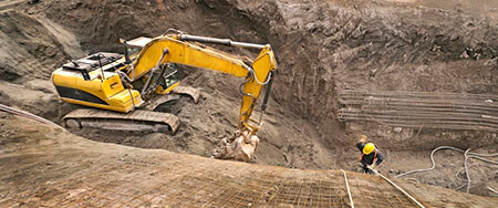 Worker and Excavator in Trench, Excavation Accidents